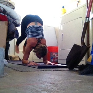 Me trying to kick up in Pincha Mayurasana with both feet at the same time! So hard! So humbling! And I'm in my laundry room! 